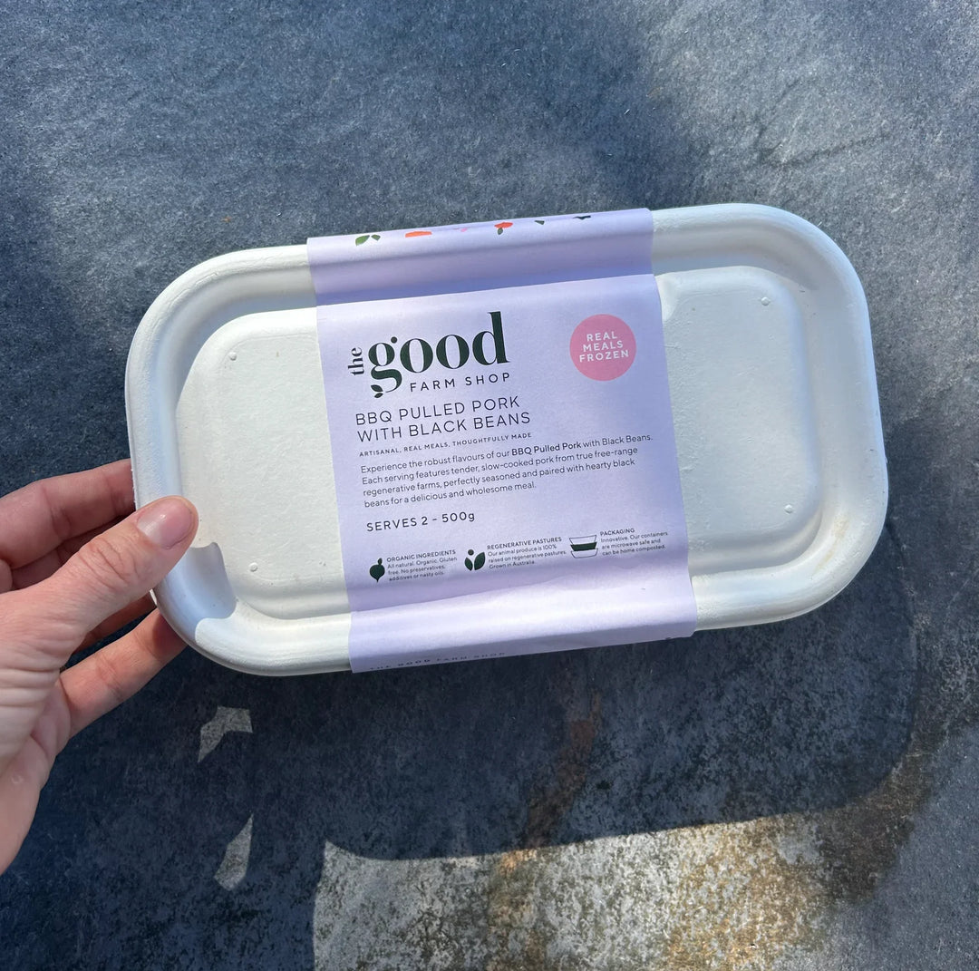 The Good Farm Shop BBQ Pulled Pork with Black Beans frozen meal in compostable tray